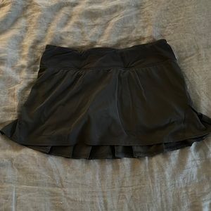 Lululemon black skort with ruffle back in size 6